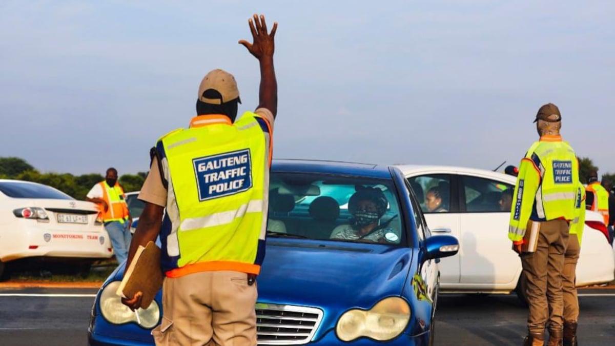 Traffic officer conducting a roadblock vehicle stop